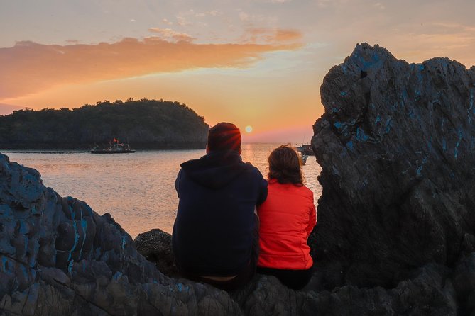 1 Day Boat Tour: HaLong Bay, Lan Ha Bay, Natural Beach and Full Moon Party - Ha Long Bay Swim and Cave Exploration at the Small Secluded Beach