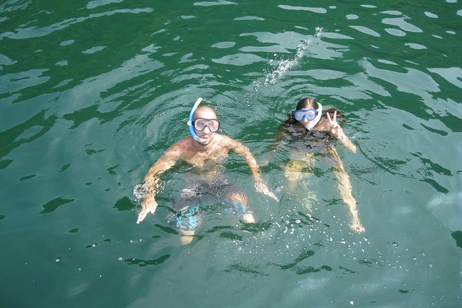 1 Day Boat Tour: HaLong Bay, Lan Ha Bay, Natural Beach and Full Moon Party - Stop 1 in Lan Ha Bay: Panoramic Views from the Fisherman’s Village Cruise