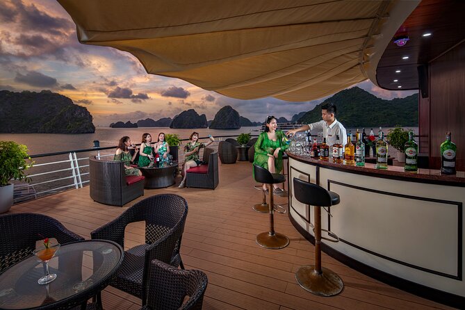 2-Day Luxury Halong Bay Aspira Cruise from Hanoi - Day 1 onboard: Tai Chi prep, sunset drinks, and the dinner rhythm