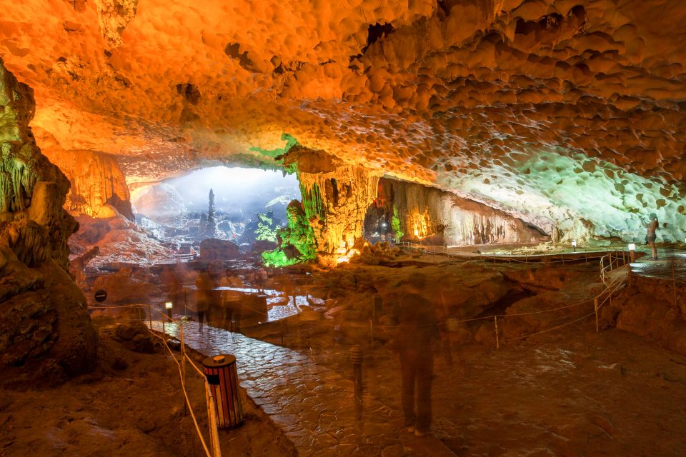 2-Day Royal Palace Ha Long Bay & Ti Top Island Cruise - Day 2: sunrise photos, Tai Chi, and Surprising Cave