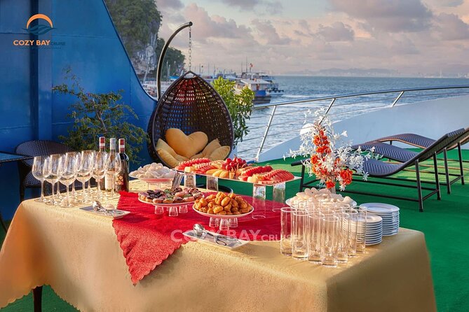Cozy Bay Halong 5-Star Day Cruise, Buffet, Cave, Kayak, Swimming - Swimming and the On-Board Sunset Party: Snacks for the Soul