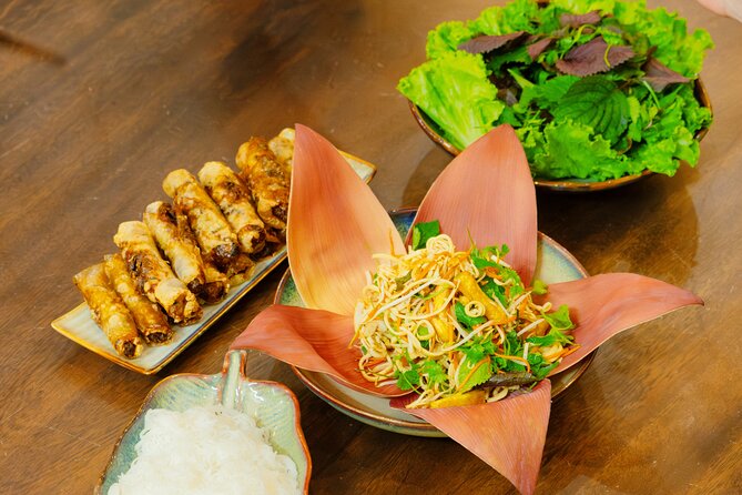 Experience Hanoi Cooking Class with Free Wine Tasting - The cooking studio lesson: knife skills and four iconic dishes