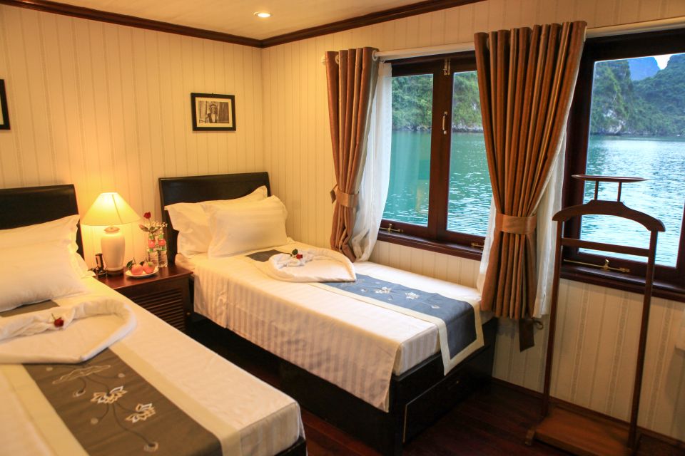 From Hanoi: 2-Day & 1 Night Halong Bay Tour - Surprise Cave and Sung Sot-style cave energy: stalactites, stairs, and photos