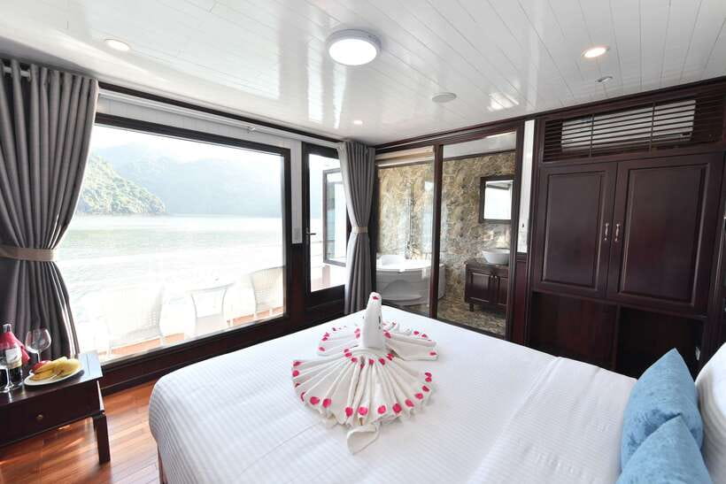 From Hanoi: 2-Day Halong Sapphire Cruise with Balcony Cabin - Day 1 on the water: Lan Ha cruising, a swim option, and spring-roll cooking