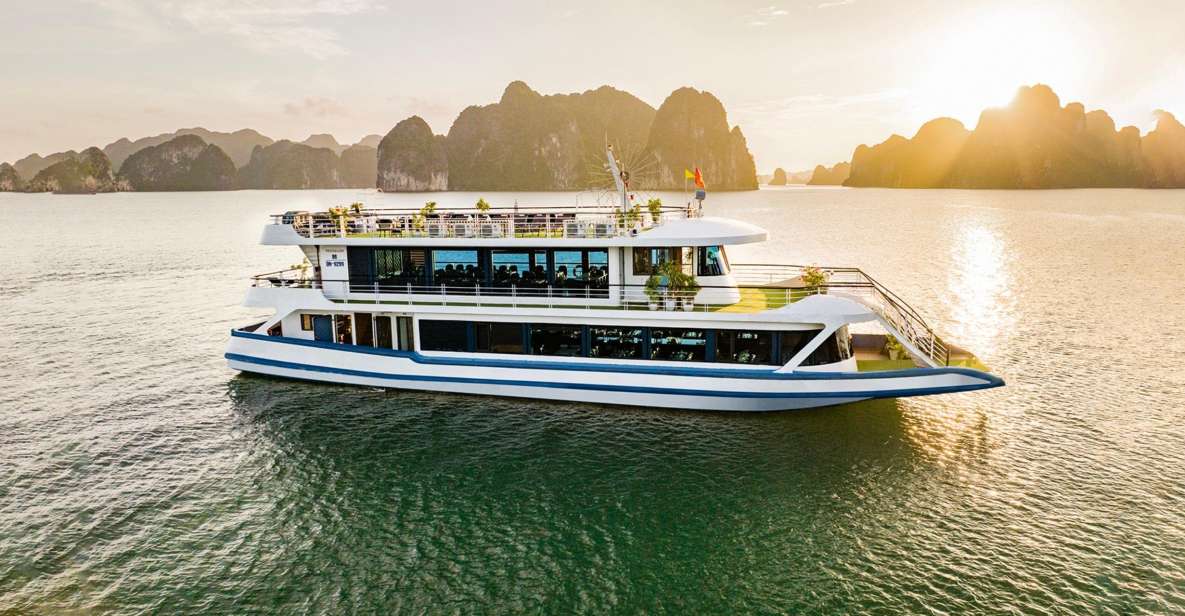 From Hanoi: Ha Long Bay 5-star Day Cruise with Buffet Lunch - Titop Island: The View Climb and the Swim Break