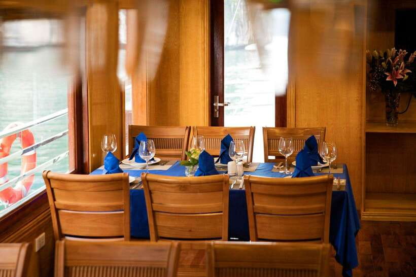 From Hanoi: Ha Long & Lan Ha Bay 2-Day Cruise with Meals - Night onboard: squid fishing, movie show, and karaoke