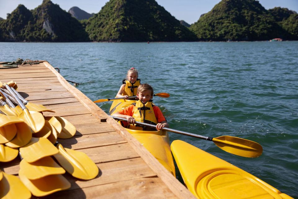 Ha Long & Lan Ha Bays: 2-Day Cruise with Meals & Kayaking - Day 1 on the water: lunch transfer, Bright Cave by bamboo boat, and cooking class