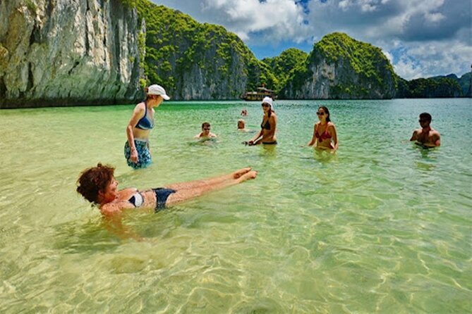 Halong Bay Day Tour 6Hour Deluxe Cruise Limousine Bus Small Group - Hang Luon Cave by Kayak or Bamboo Boat: The Water-Cave Moment