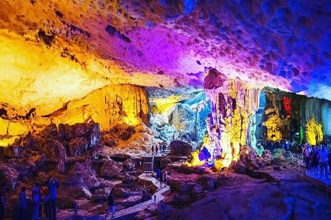 Halong Bay Day Tour: Visit Cave Island Kayaking Swimming Lunch - Tuan Chau boarding and the seafood lunch while rocks slide by
