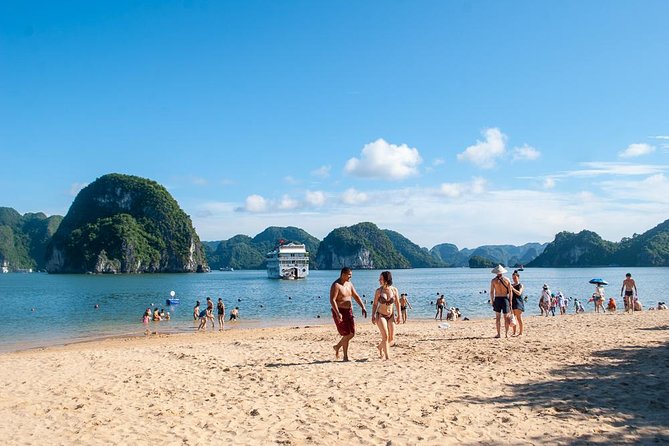 Halong Bay Day Tour With Titop Island, Cave, Kayak & Lunch - Hang Luon Cave Area: Kayaking or Bamboo Boat for a Slower Kind of Thrill