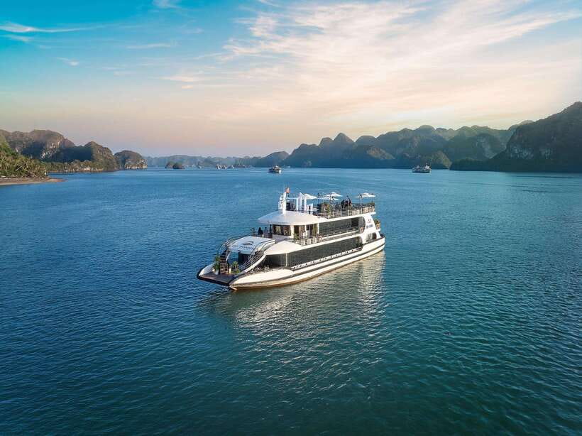 Halong Bay: Luxury Day Cruise with Buffet, Kayak, Swim - Surprising Cave: stalagmites, stalactites, and photo fuel