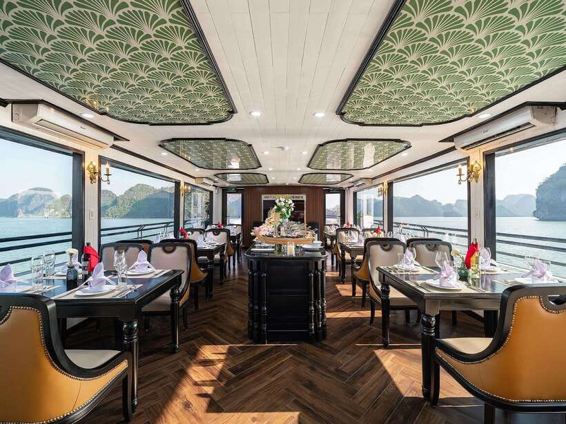 Halong Bay: Luxury Day Cruise with Buffet, Kayak, Swim - Sunset party on the return: music, wine, snacks, and that golden light