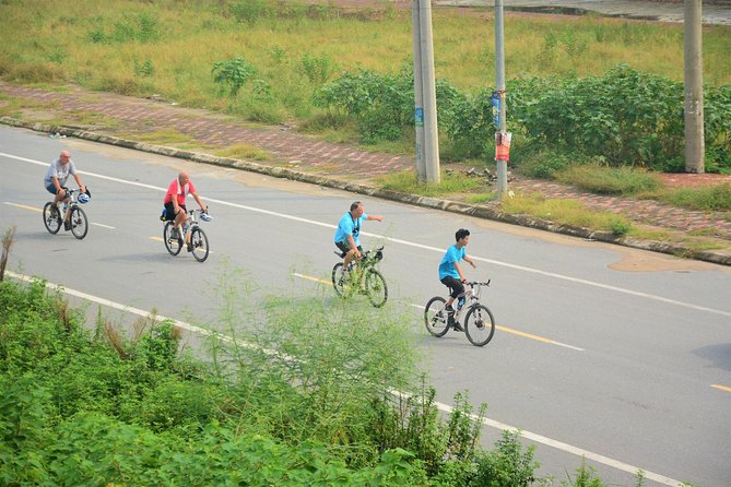 Hanoi Bicycle Tours: Half Day Bicycle Tours Hanoi Countryside - Getting Out of Hanoi: Pickup, Bike Fit, and Scooter-Supported Safety