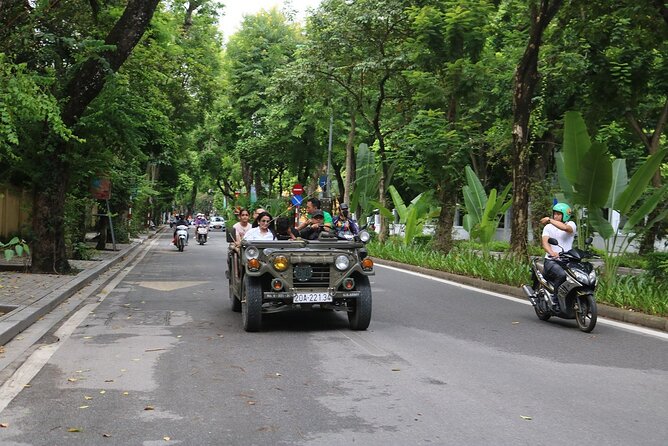 Hanoi City Tour Highlight, Train Street Combine visit Countryside - West Lake (Tay Ho) and the John Mc monument stop
