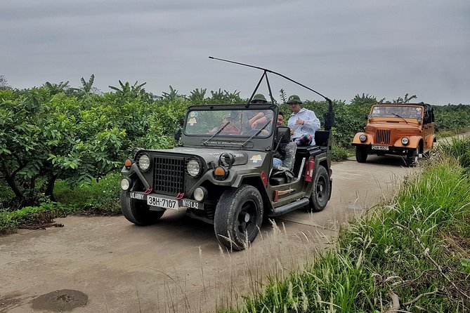 Hanoi Jeep Tour: Red River Countryside Culture & Daily Life - Jeep ride comfort, rain ponchos, and driver safety