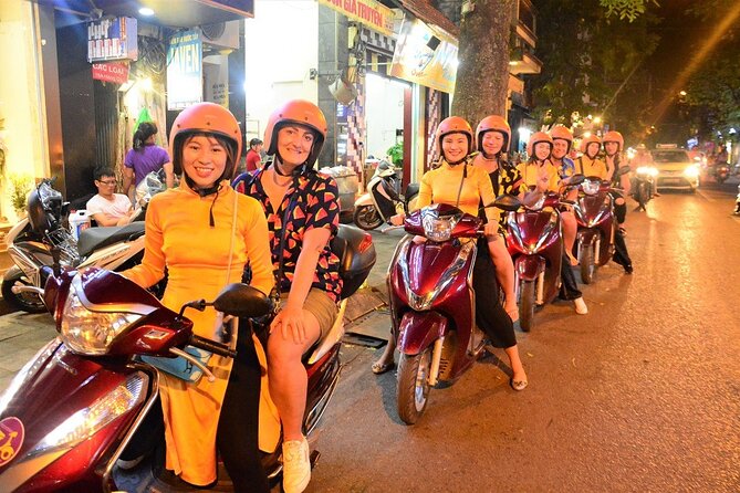 Hanoi Motorbike Tours Led By Women: Hanoi By Night Foodie Motorbike Tours - Hanoi by night, from the back of a Honda Lead
