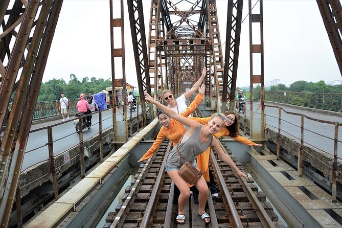 Hanoi Motorbike Tours Led By Women: Hanoi City Insight Motorbike Tours - Duờng Tàu and Train Street area: seeing the railway vibe up close