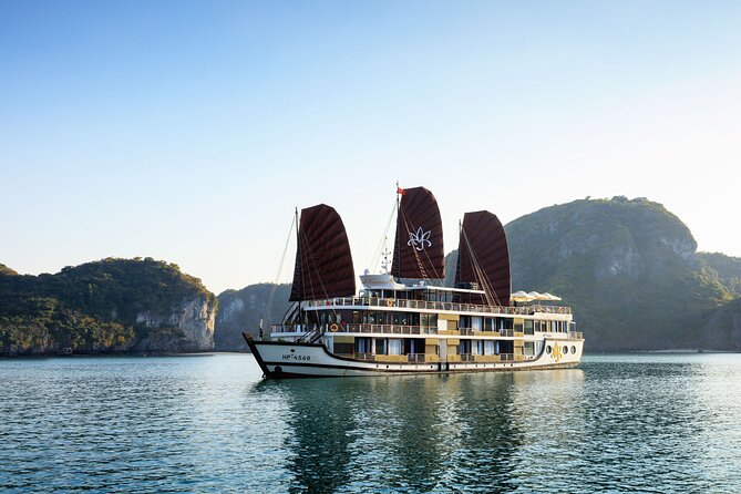 Orchid Cruises 2Days/1Night 5 Star All included - Day 2 at Halong Bay: dawn Tai Chi, light breakfast, and a calm start
