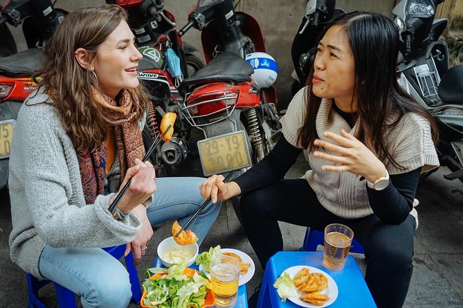 The 10 Tastings of Hanoi With Locals: Private Street Food Tour - Stop 1: Thang Long Water Puppet Theater area sets the mood
