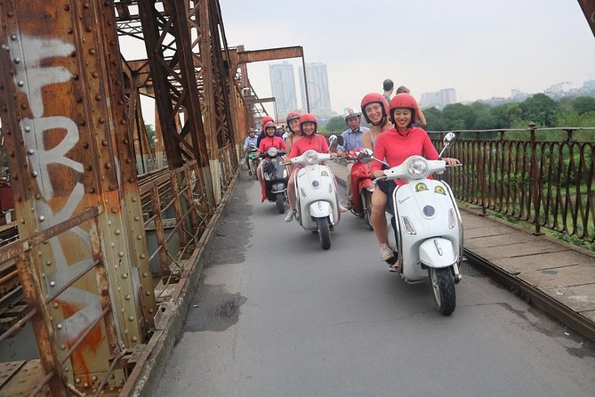Vespa City Tour &Train Street Female With Ao Dai Riders 4,5 Hours - Stop-by-stop: Opera House, Long Bien Bridge, and the backstreet rhythm