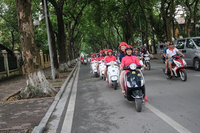 Vespa City Tour &Train Street Female With Ao Dai Riders 4,5 Hours - Safety gear and a real briefing before you roll