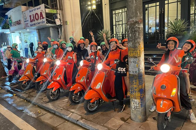 Vespa Female Ao Dai riders Night Street Food + See Train Street - Night Vespa with Ao Dai guides: what the experience feels like