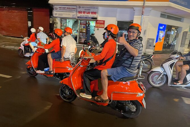 Vespa Female Ao Dai riders Night Street Food + See Train Street - Food you’ll actually be eating: more than one snack